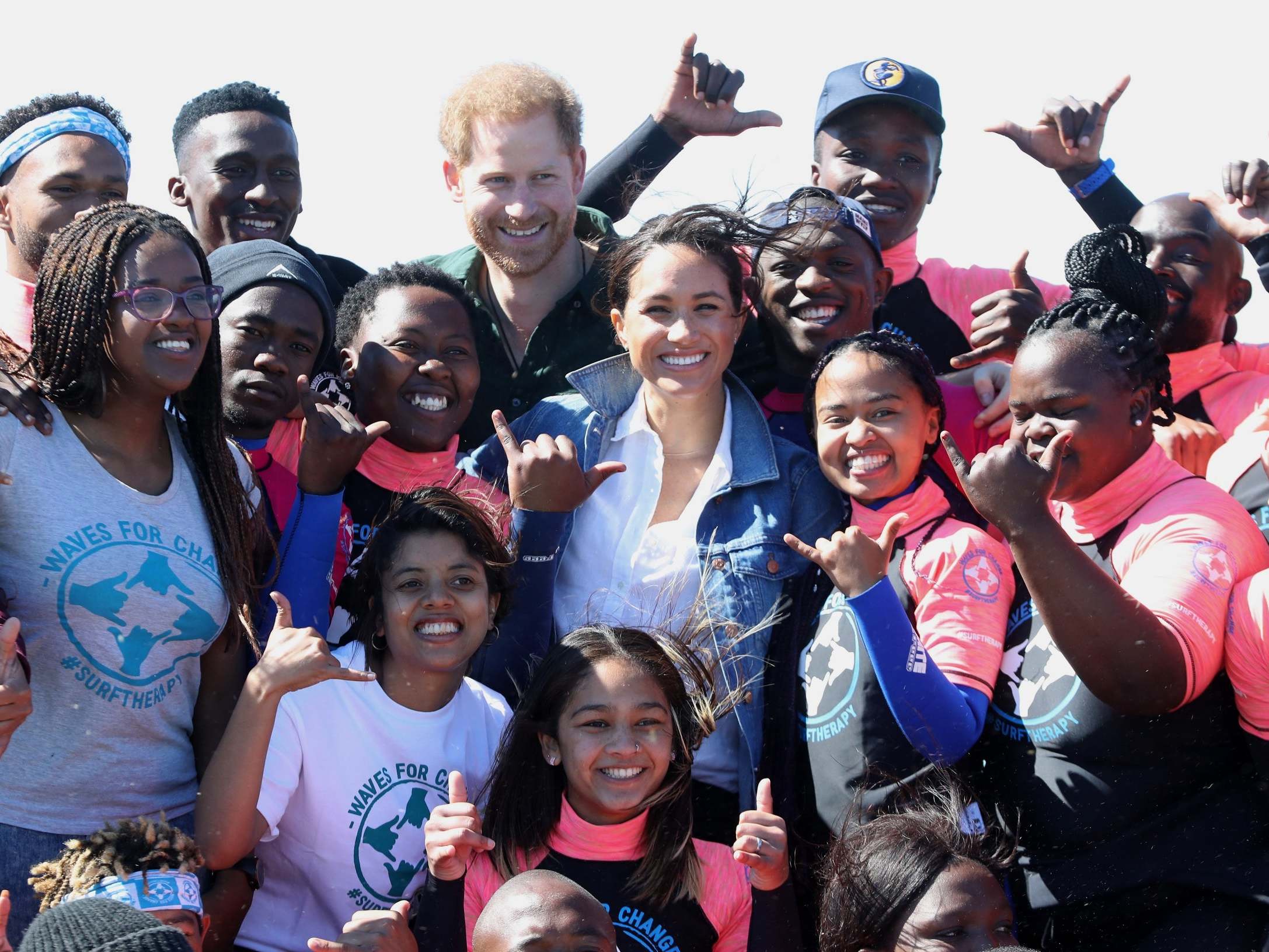 Duke and Duchess of Sussex with surf mentors from Waves for Change