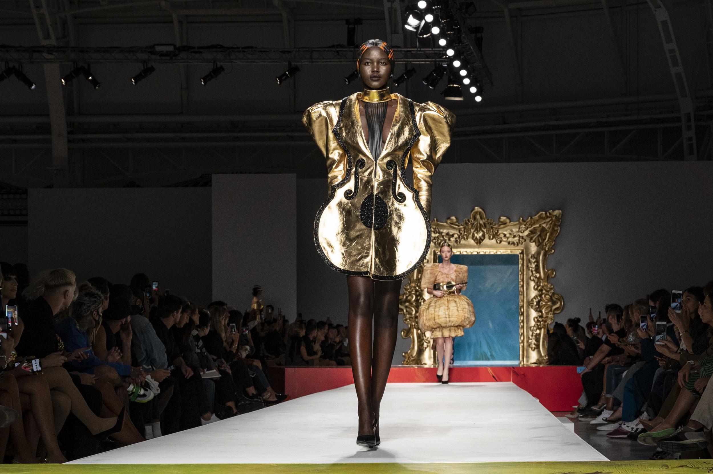 Moschino sent models down the runway in wearable art (AFP/Getty Images)