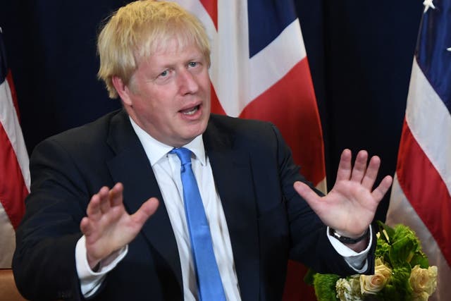 Boris Johnson speaks to the media during a meeting with US President Donald Trump at UN Headquarters in New York on Tuesday