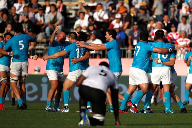 Uruguay players celebrate victory