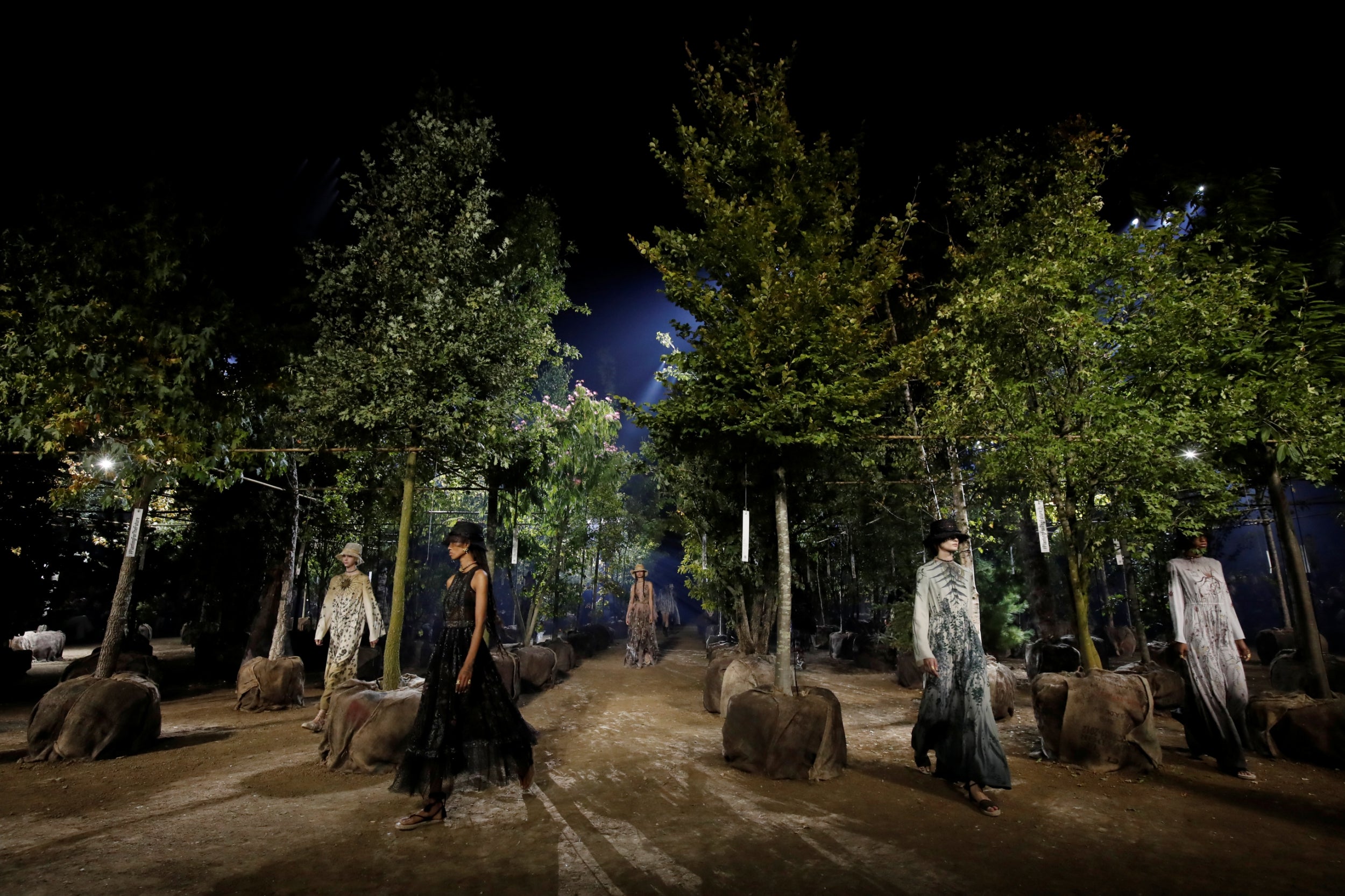 Dior presented a green show space decorated with 164 trees