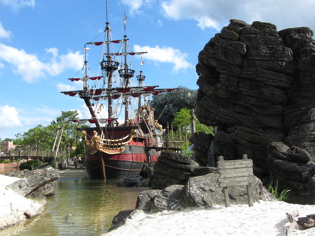 Captain Hook's pirate ship anchored near Skull Rock in the Adventureland area of Disneyland Paris