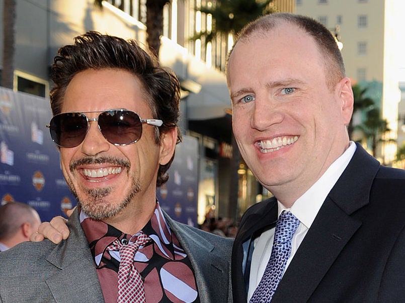 Robert Downey Jr and Kevin Feige at the premiere of Captain America: The First Avenger in 2011