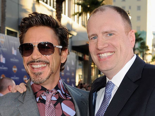 Robert Downey Jr and Kevin Feige at the premiere of Captain America: The First Avenger in 2011