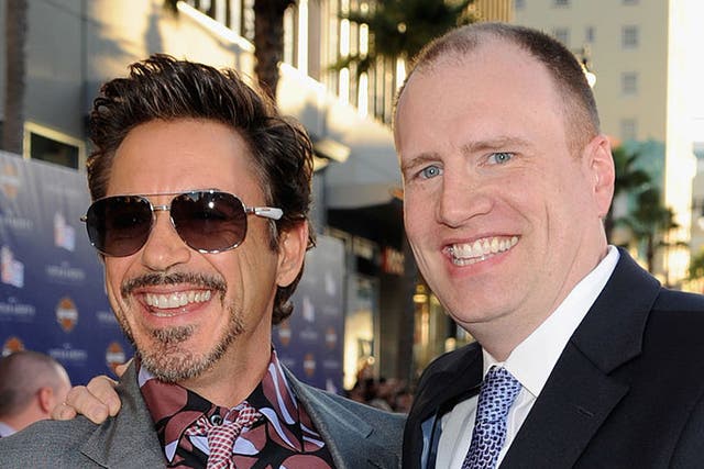 Robert Downey Jr and Kevin Feige at the premiere of Captain America: The First Avenger in 2011