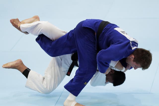 Jack Hatton (blue) in competition in August 2019