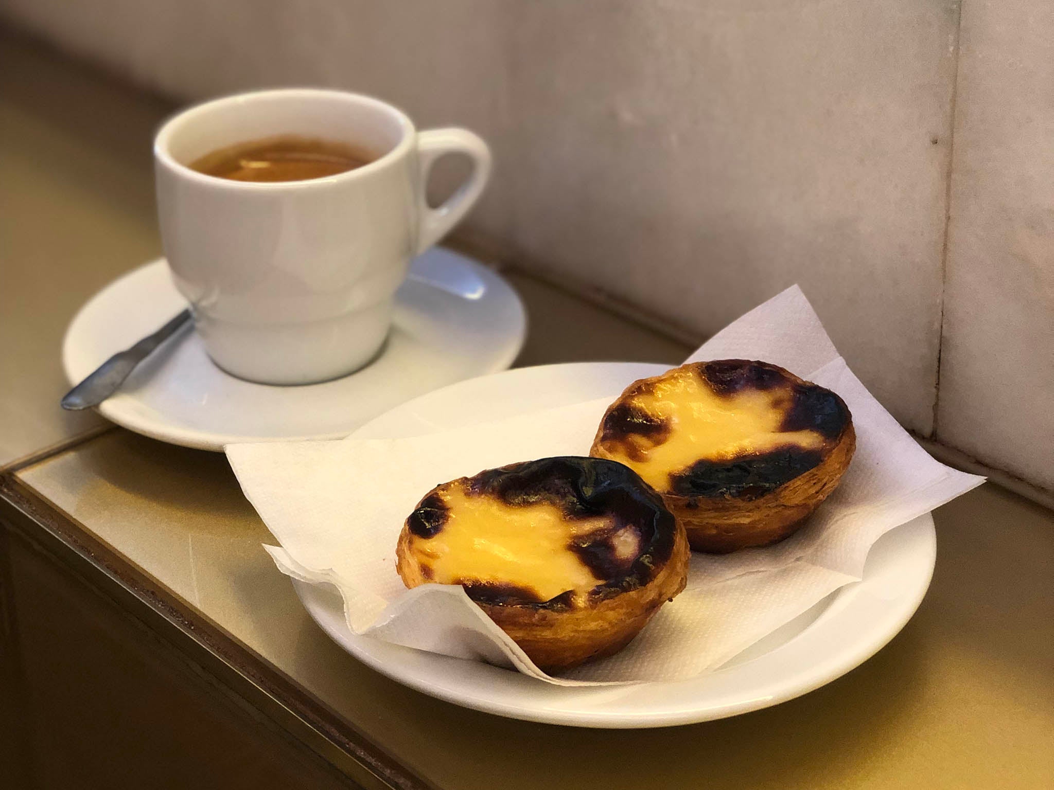 Across two trips to the city, Ed visited the Manteigaria shop about nine times for coffee and pastel de nata