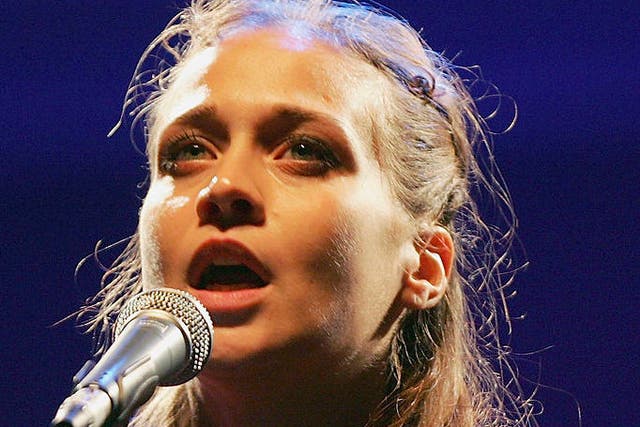 Musician Fiona Apple performs at a Hurricane Katrina benefit concert in 2005
