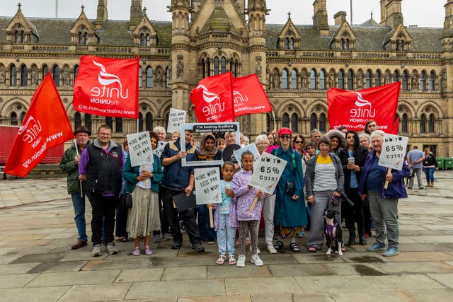 Members of Unite and concerned residents picket outside Bradford City Hall to raise public awareness of the cuts to library and museum funding