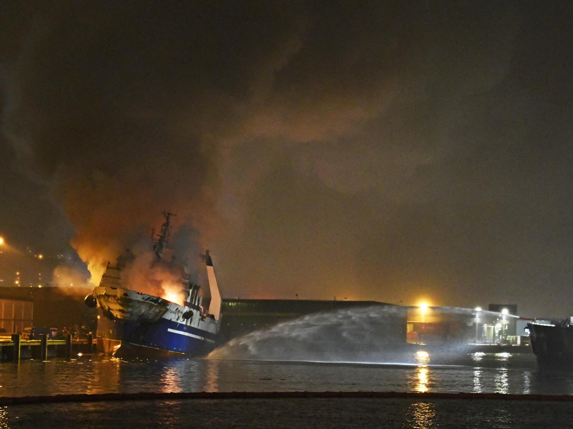 The Russian fishing trawler, Bukhta Naezdnik engulfed in flames in the harbour of Tromso, Norway