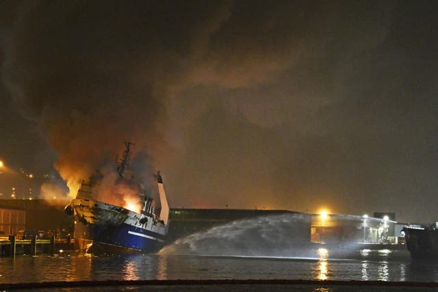 The Russian fishing trawler, Bukhta Naezdnik engulfed in flames in the harbour of Tromso, Norway