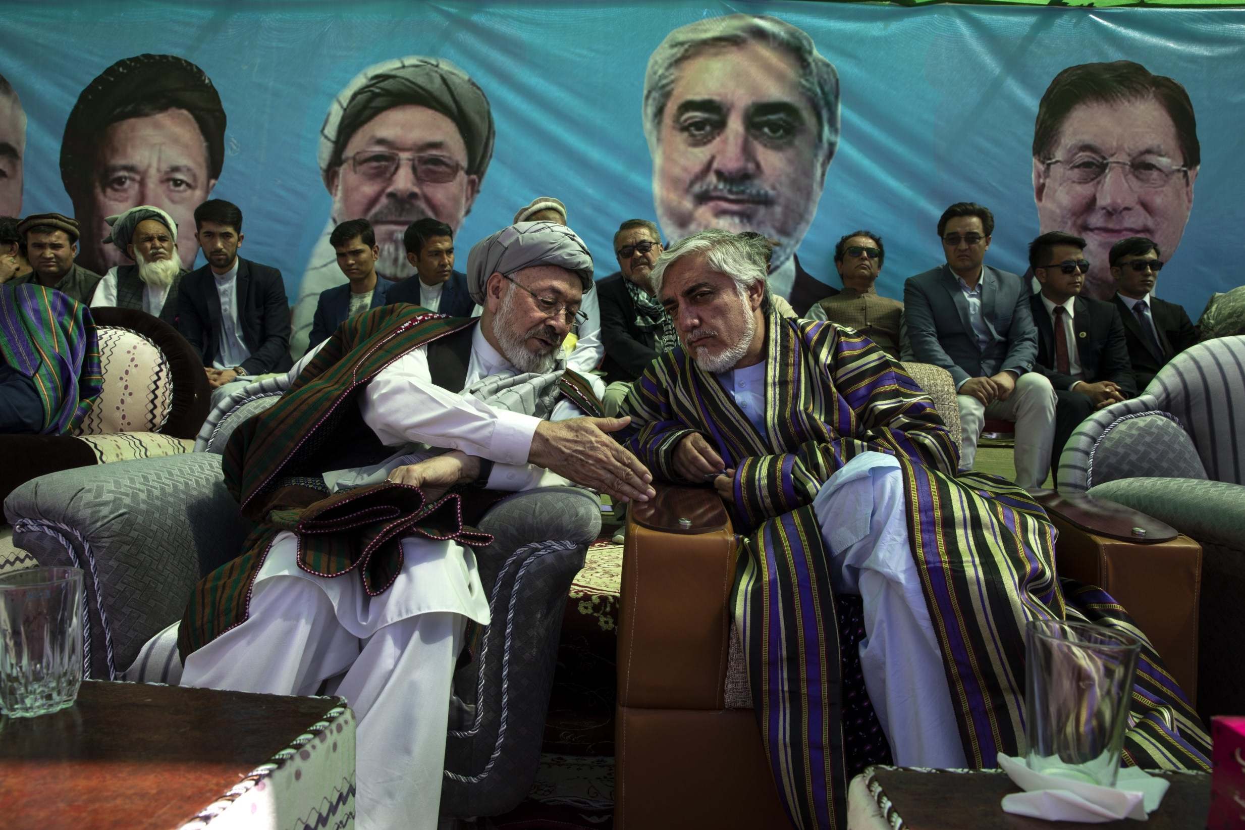 Abdullah Abdullah speaks with with Ustad Abdul Karim Khalili in Bamiyan (Getty)