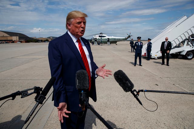 President Donald Trump speaks to reporters at Andrews Air Force Base in Maryland