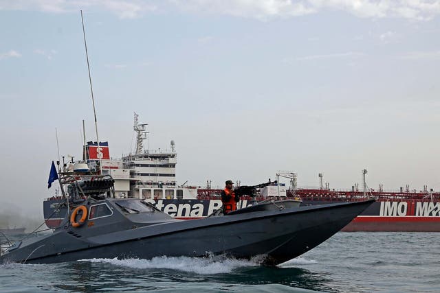 Iran's Revolutionary Guard jet boat patrols around the detained British-flagged tanker Stena Impero in Bandar Abbas, southern Iran
