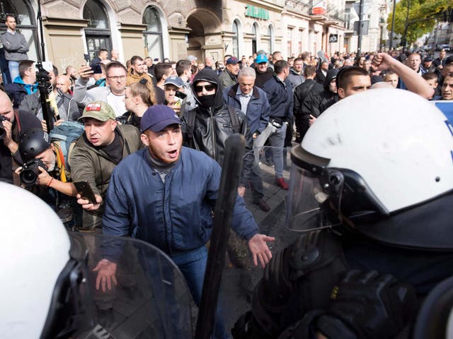 Riot police defended an LGBT+ march from far-right protesters in Lublin, Poland