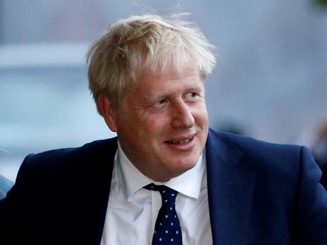 Boris Johnson arrives in Manchester ahead of the Tory conference yesterday