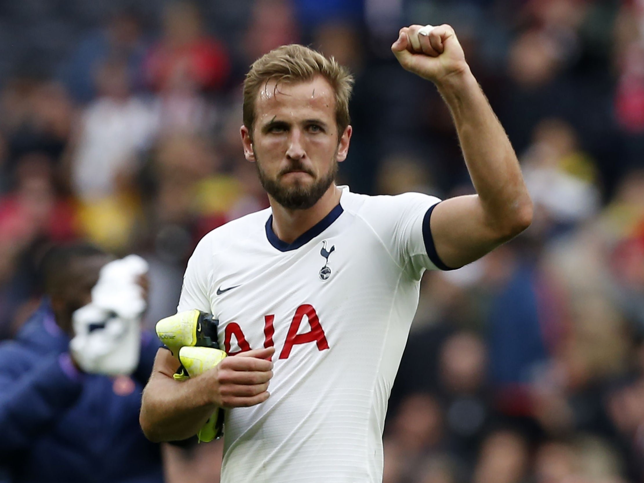 Kane scored the winner as ten-man Spurs fought to a battling victory (AFP/Getty Images)