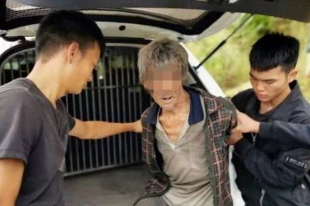 Song Jiang after being arrested in Yunnan province