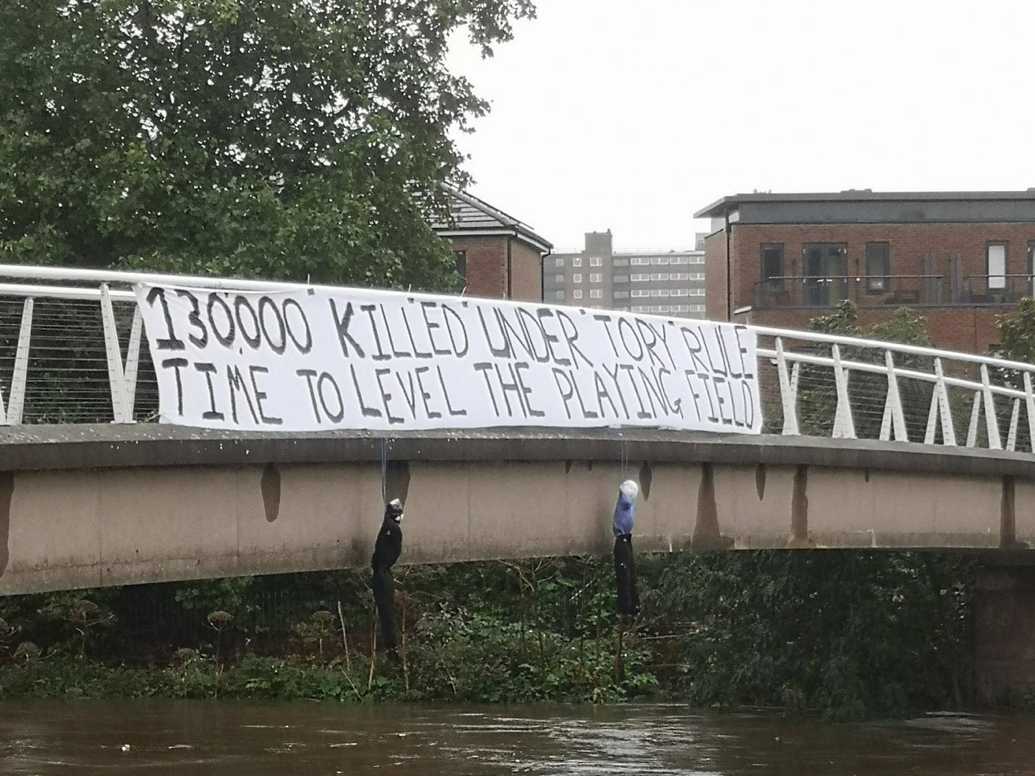 The banner was hung over the River Irwell