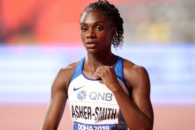 Dina Asher-Smith celebrates winning her 200m heat