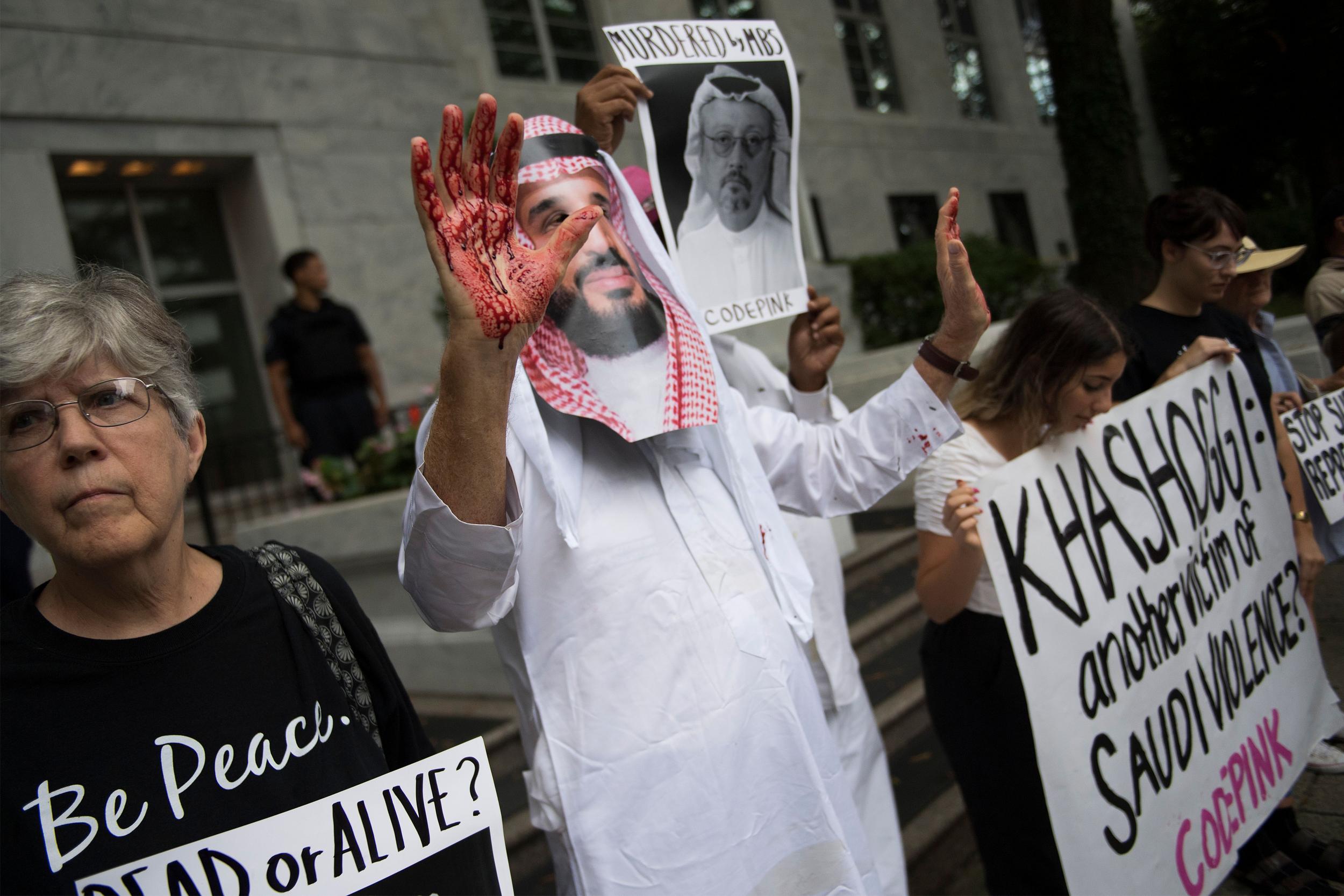 A demonstrator dressed as Saudi Arabian Crown Prince Mohammed bin Salman protests outside the Saudi Embassy in Washington DC (Jim Watson/AFP/Getty)