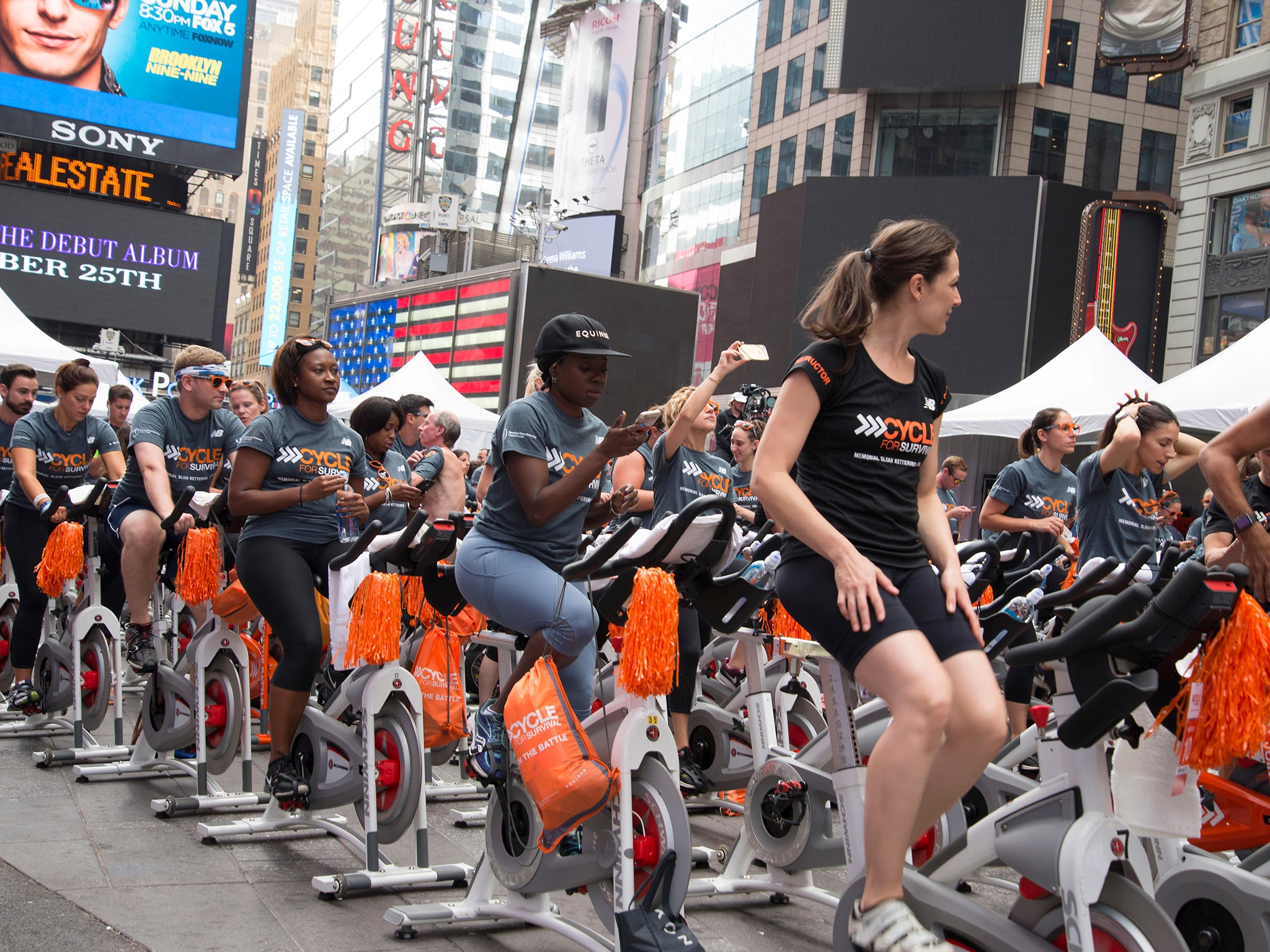 Outdoor spin class in Times Square: most New Yorkers will spend weekends at activities like this