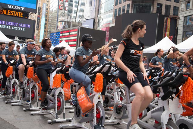Outdoor spin class in Times Square: most New Yorkers will spend weekends at activities like this