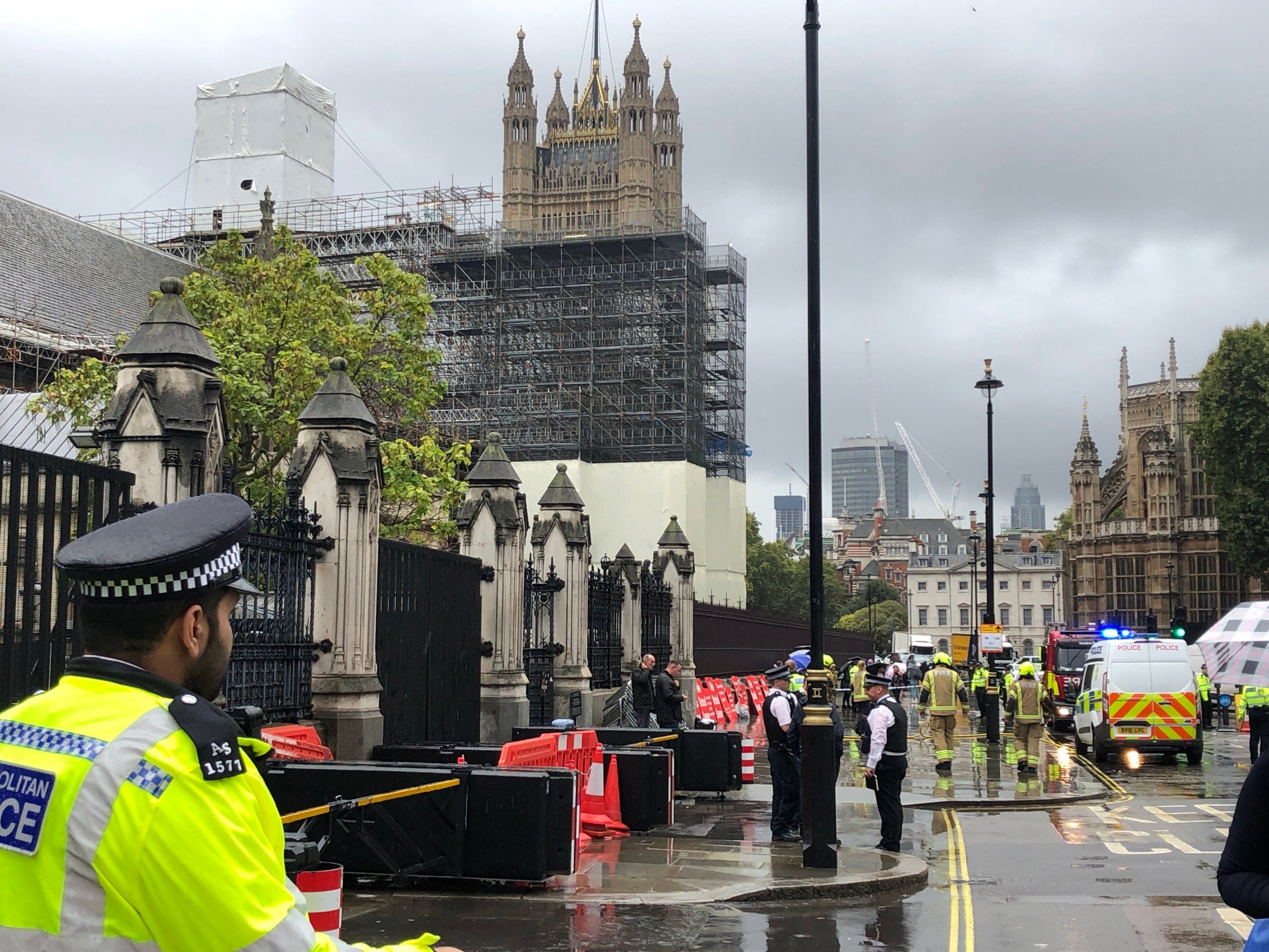 &#13;
Police and firefighters outside the Old Carriage Gates &#13;