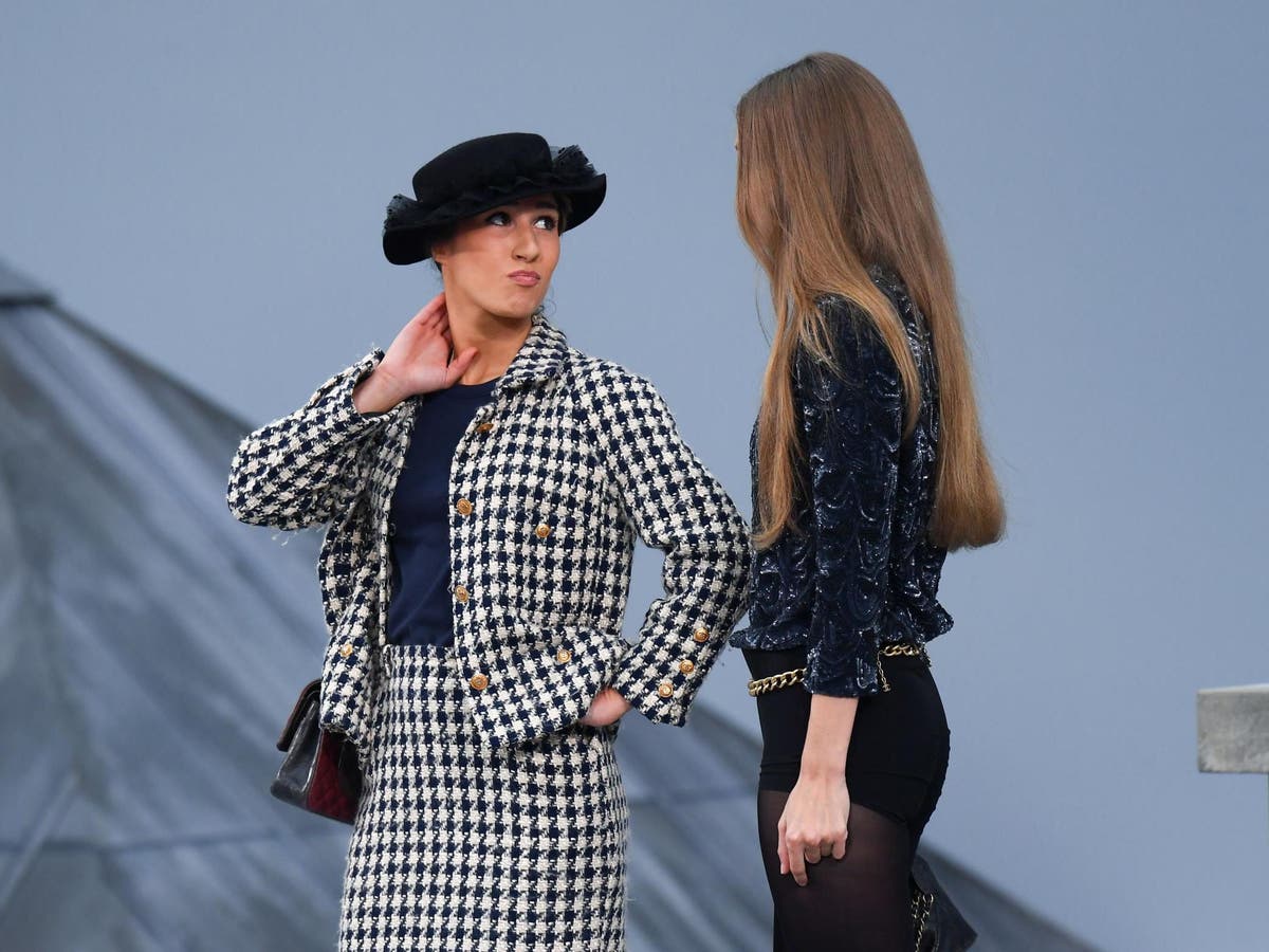Gigi Hadid intercepts runway intruder during Chanel's Paris Fashion Week  show