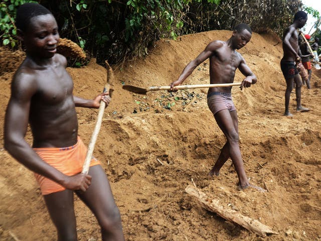 Miners work on the diamonds mine of Banengbele, south of Boda