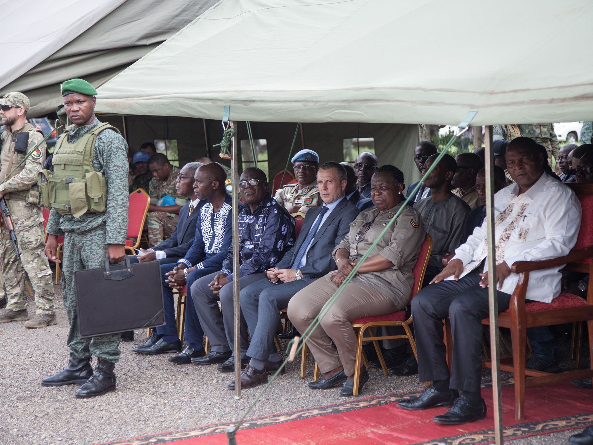 Officials including President Touadera and Victor Tokmakov, first secretary of the Russian embassy, attend military training