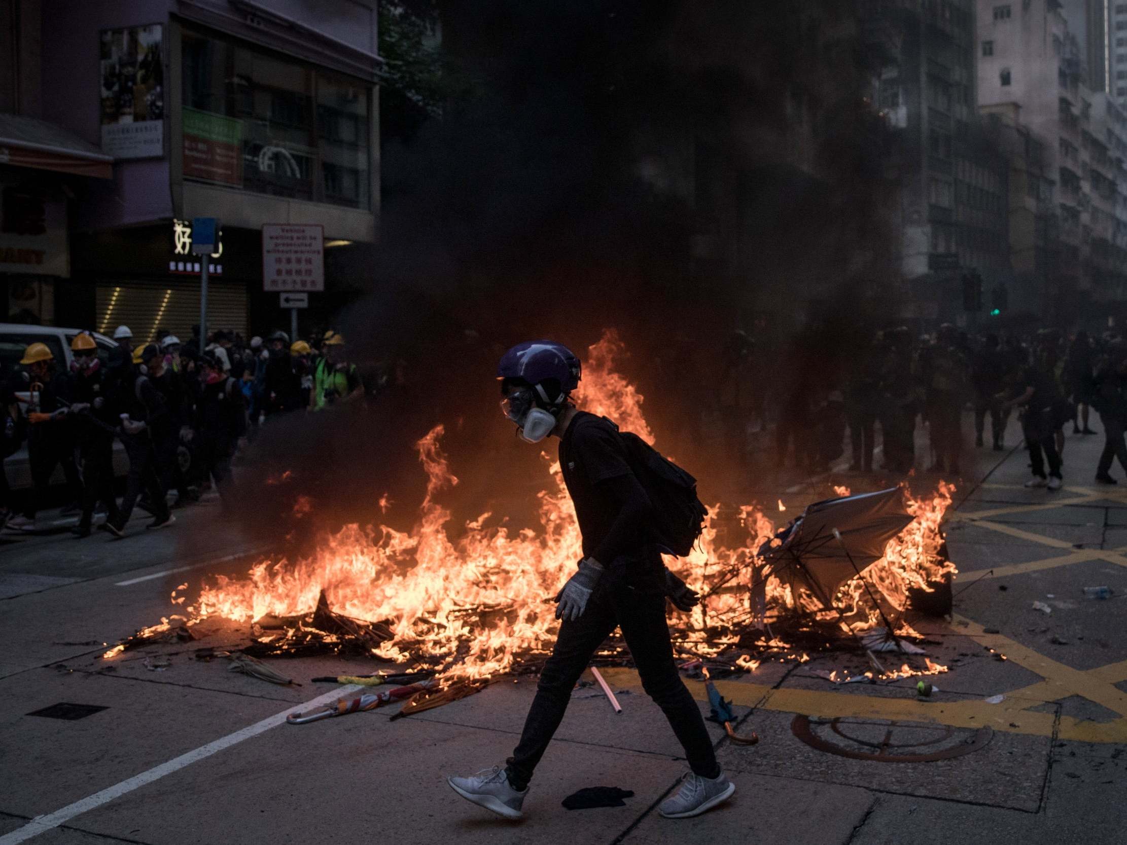 Video: Young man shot in chest as police fire live rounds at Hong Kong protesters