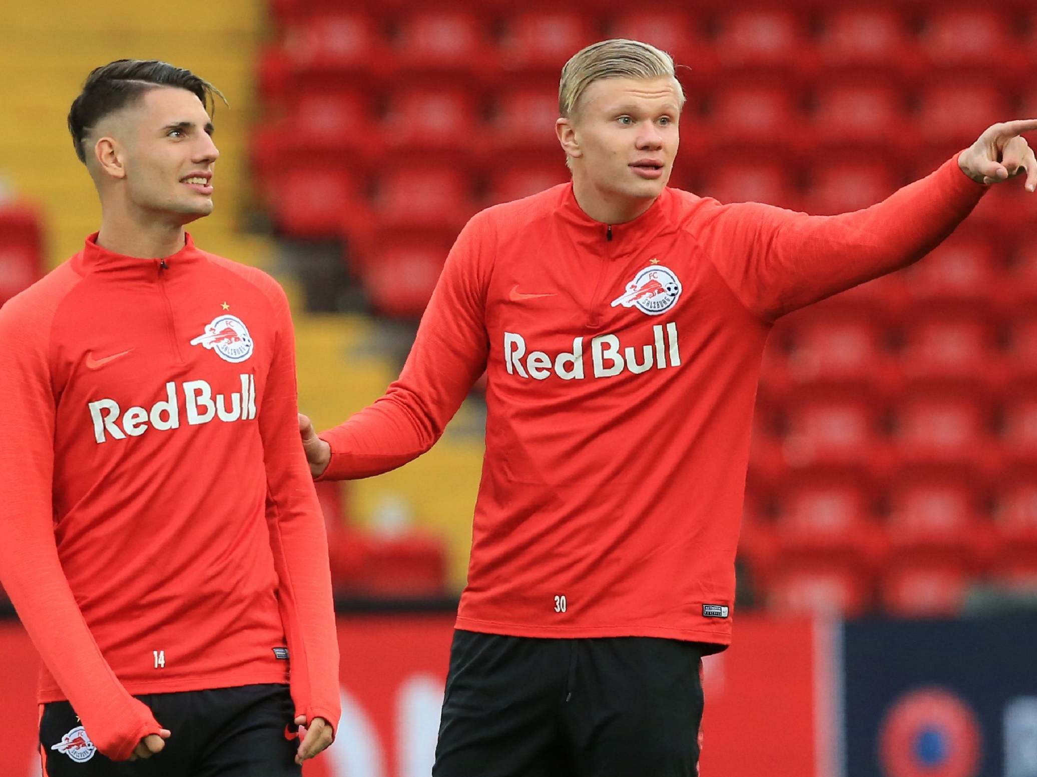 Dominik Szoboszlai chats with Erling Braut Haland at Anfield