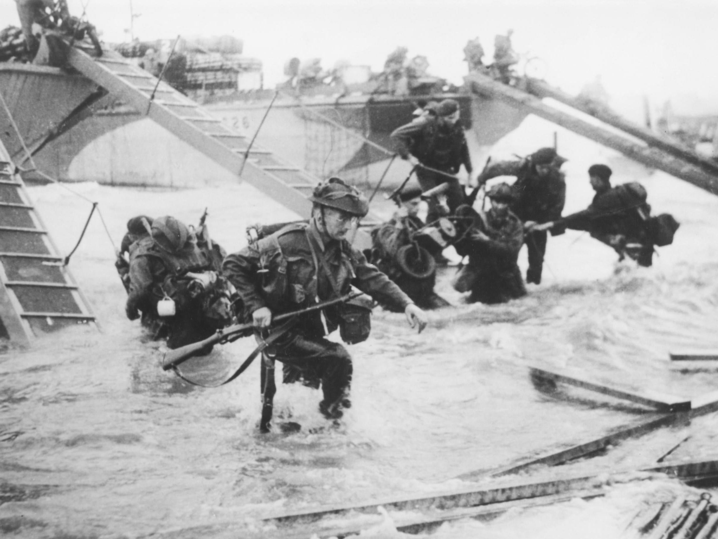 Troops from the 48th Royal Marines at Saint-Aubin-sur-Mer on Juno Beach, Normandy (Getty)