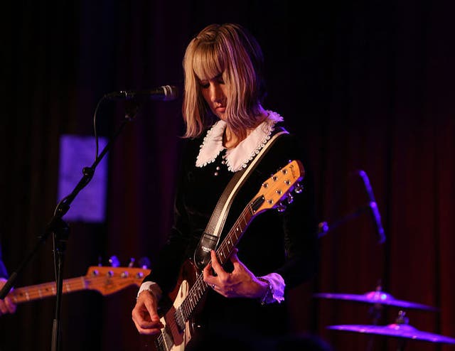 Kim Shattuck performing with The Muffs at the CBGB Music & Film Festival in 2014