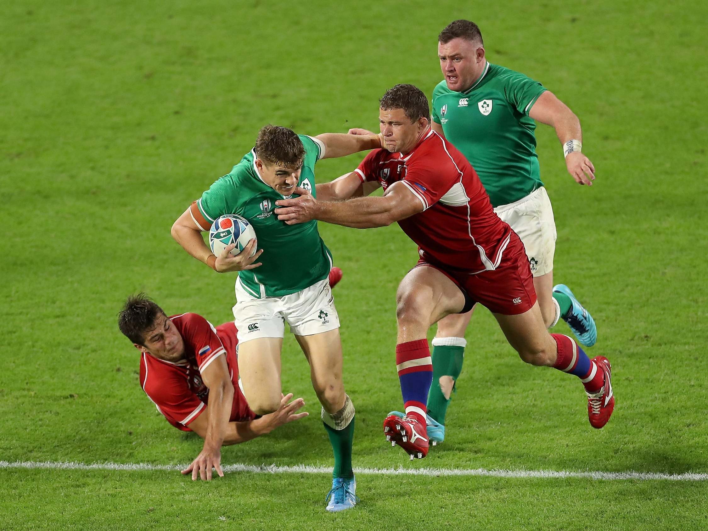 Ireland’s Garry Ringrose tries to hold off Kirill Gotovtsev