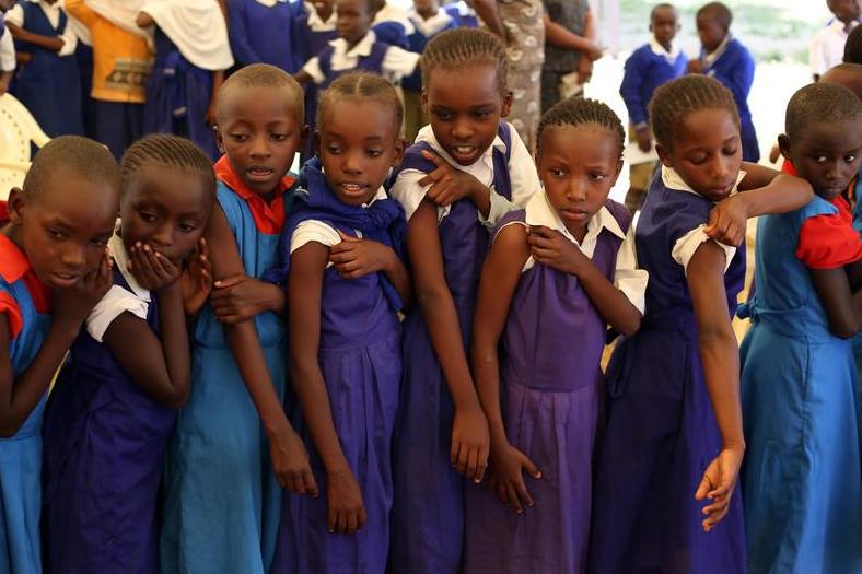 Kenyan schoolchildren after getting an injection against cervical cancer – the papillomavirus that causes it may loiter for years