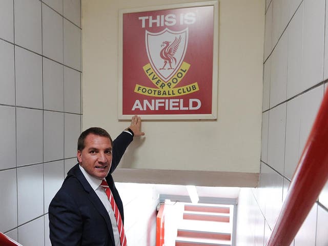 Brendan Rodgers poses as the new Liverpool manager in June 2012