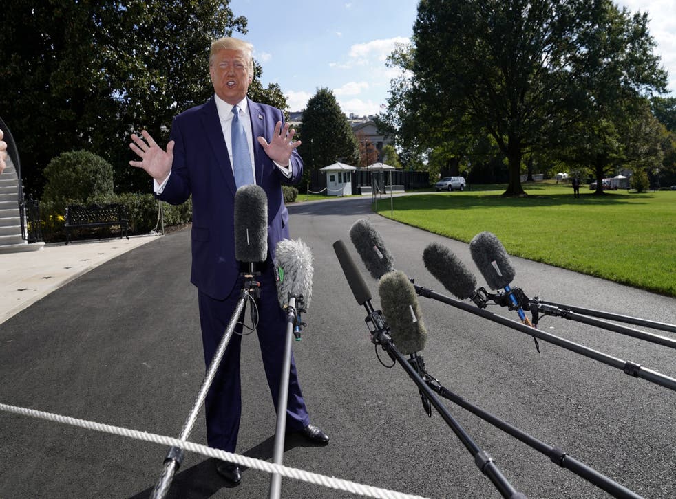 The American leader addresses reporters outside the White House