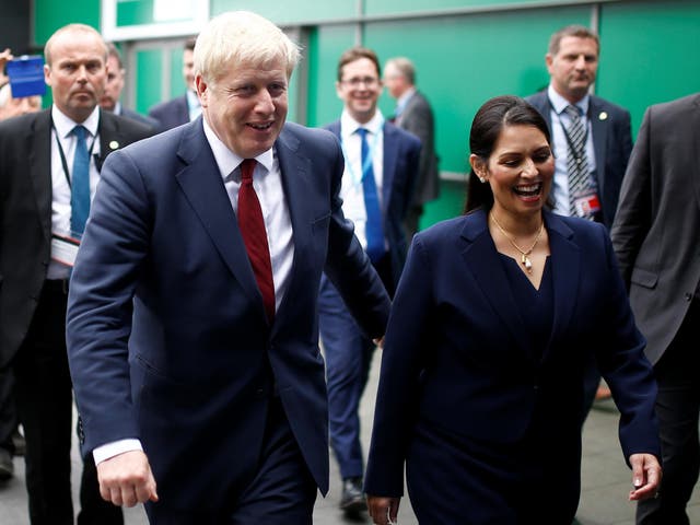 By this summer, climate change had risen to among the three most important issues facing this country. Pictured is Boris Johnson and Home Secretary Priti Patel
