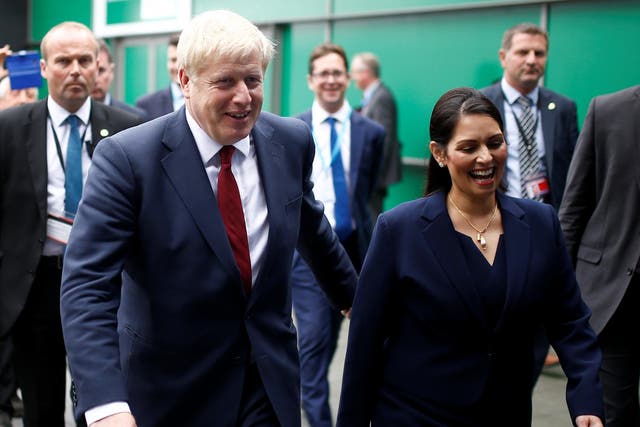 By this summer, climate change had risen to among the three most important issues facing this country. Pictured is Boris Johnson and Home Secretary Priti Patel