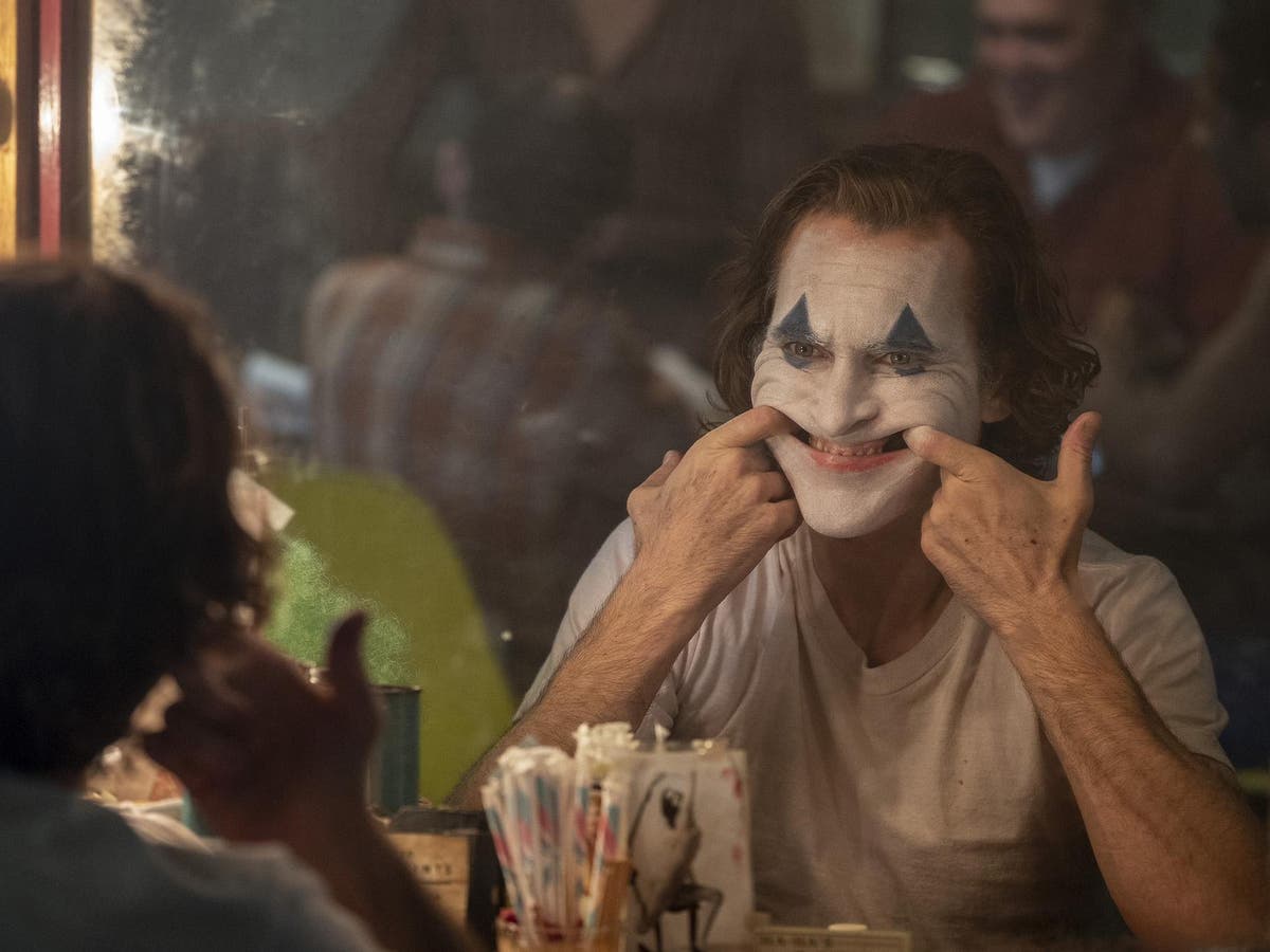 Ryan Reynolds bows down to Joaquin Phoenix as Joker film beats Deadpool box office record