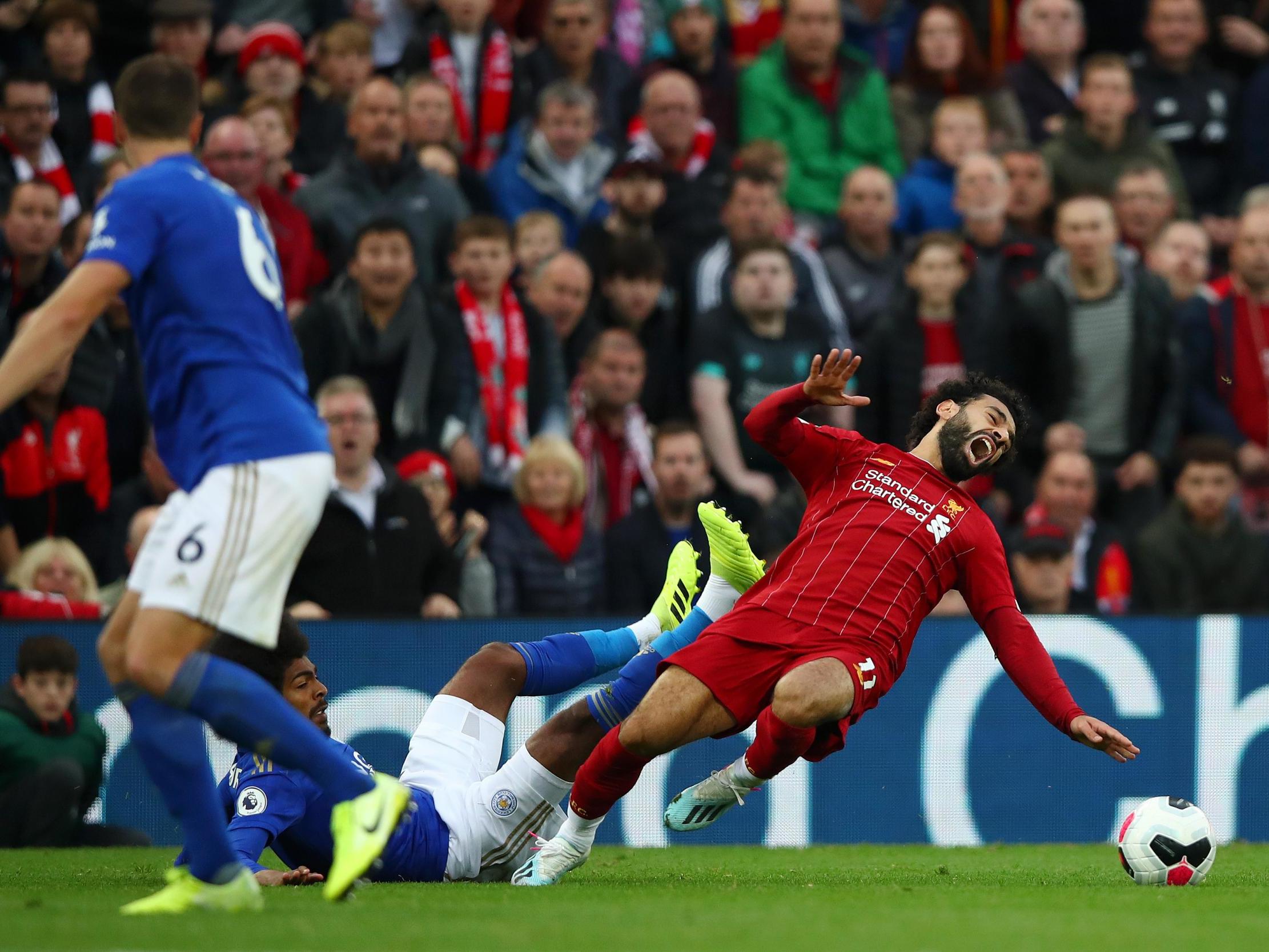 Leicester City's Hamza Choudhury tackles Liverpool's Mohamed Salah