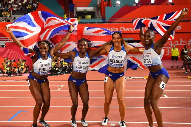 Britain's Asha Philip, Dina Asher-Smith, Ashleigh Nelson and Daryll Neita celebrate winning silver