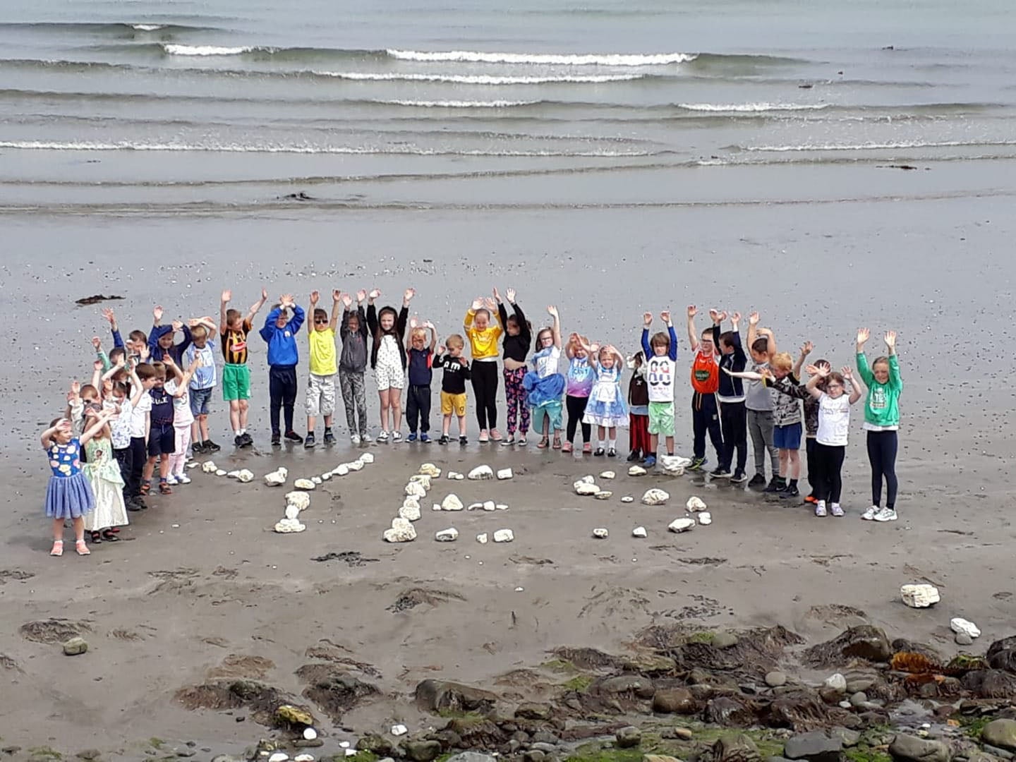 Pupils at Seaview Primary School in Glenarm celebrate their school voting to become integrated