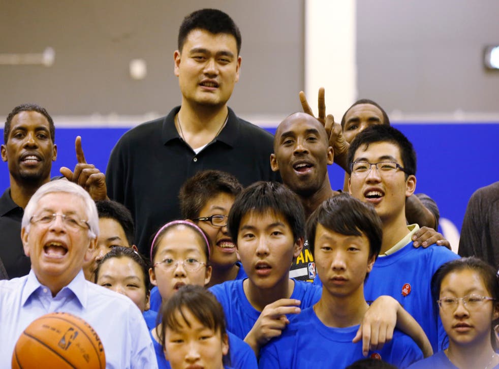 Former Rockets star and now Chinese Basketball Association president Yao Ming (top row centre) poses alongside Kobe Bryant during a 2013 event in Shanghai