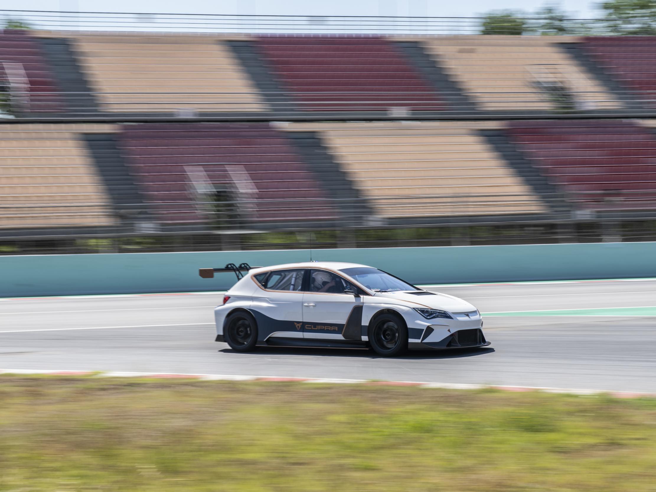 The Seat Cupra e-Racer being taken for a test spin on the race track