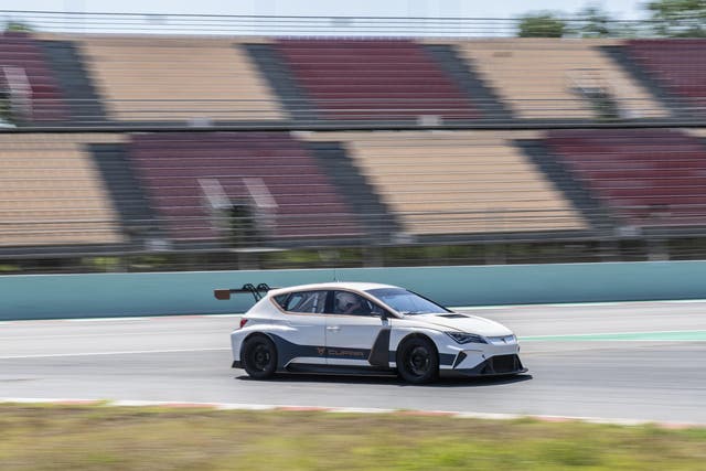 The Seat Cupra e-Racer being taken for a test spin on the race track