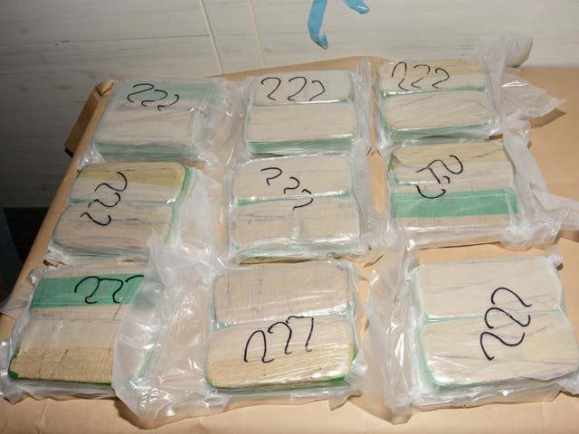 Packages seized in an operation against a gang accused of importing more than 50 tonnes of drugs worth billions of pounds into the UK from the Netherlands
