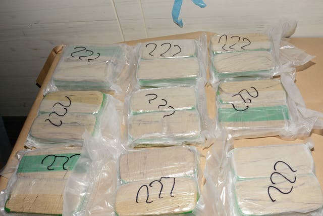 Packages seized in an operation against a gang accused of importing more than 50 tonnes of drugs worth billions of pounds into the UK from the Netherlands